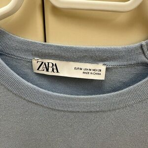 Zara spring light sweater in light blue! Gold buttons on the arms